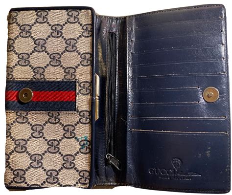 old gucci wallet styles.